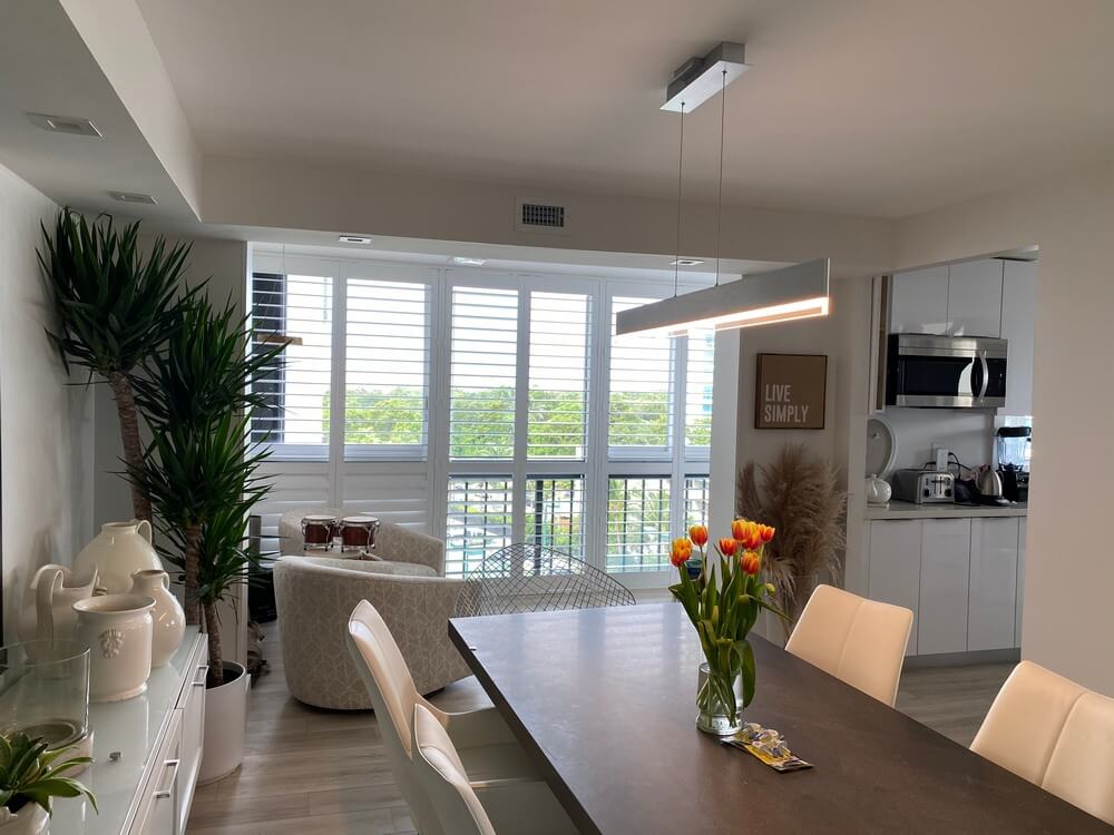 Elegant Polyclad Plantation Shutters Custom-Made for Adriana on Brickell Ave in Miami, FL
